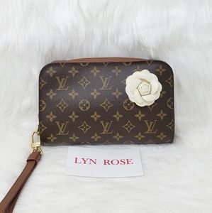 Louis Vuitton Orsay Clutch